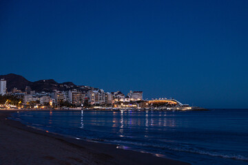 Fototapeta na wymiar balco de la mediterraneia in benidorm with the illuminated skyline at night