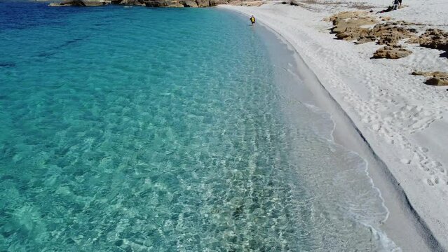 aerial view of the crystalline waters of the sea of ​​is arutas and mari ermi beach in sardinia
