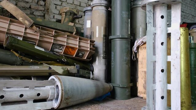 A shell from a multiple rocket launcher system. Russia is shelling Ukrainian cities. Ukraine War. russian rocket. Destroyed burnt Russian military equipment. Russian rocket and artillery strikes 4k
