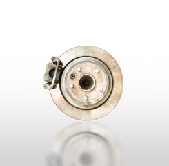 Car metal disc brake isolated and brake caliper on white background with reflection, clipping path included.