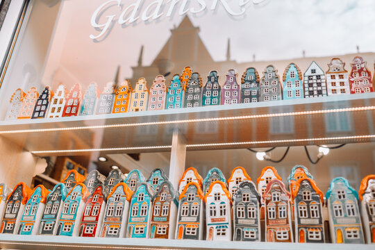 Color ceramic houses, Famous souvenir miniature in a shop window from Gdansk, Poland display on the market, Vintage housing background. High quality photo