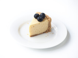 blueberry cheese pie on white plate