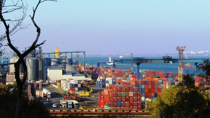 Obraz premium Port view. Odessa port. Container terminal. Loading containers on trucks