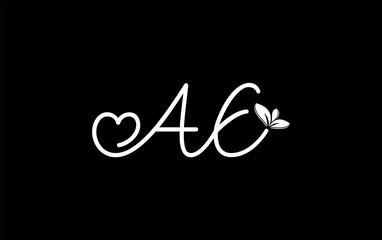 Fototapeta premium Nutrition logo and green healthy love leaf symbol with love font logo design. Heart sign leaf nature logo. Green eco letters logo