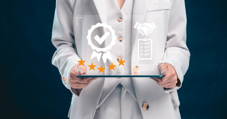 Businesswoman Hand shows the sign of the top service the best Quality assurance, Guarantee, Standards, guarantee product and ISO service concept. ISO certification and standardization concept.