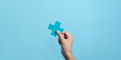 Health insurance concept. people hands holding plus and healthcare medical icon, health and access to welfare health concept.