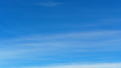 Looking up at blue sky in rural Cornwall, UK