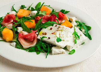 salad, melon with prosciutto, arugula, and cheese, summer salad, vegetarian, homemade, no people,