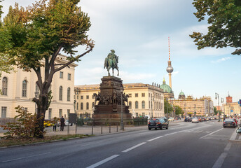 Unter den Linden Boulevard with Frederick the Great Statue and Fernsehturm TV Tower - Berlin, Germany © diegograndi