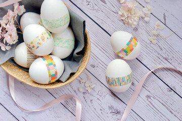 Decorated Easter eggs in a basket.