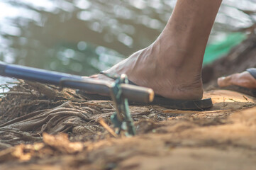 Fishing rods stuck in the support on the edge of a river,fishing concept