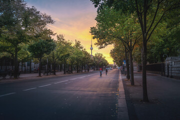 Unter den Linden Boulevard with Fernsehturm TV Tower at sunrise - Berlin, Germany
