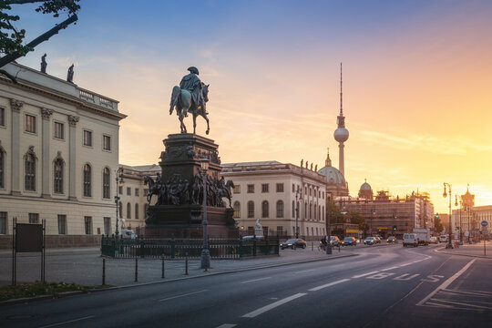Unter den Linden Boulevard with Frederick the Great Statue and Fernsehturm TV Tower at sunrise - Berlin, Germany