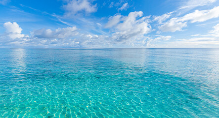 Crystal clear sea water bay. Pristine ocean lagoon sunny cloudy sky, idyllic relaxing seascape....