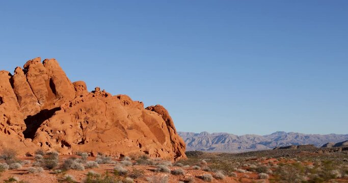 Drive Plate-Passing unique orange rock formation in the Mojave Desert in the Valley of Fire State Park of Southern Nevada.  This massive formation shows erosion in the red/orange Aztec Sandstone.