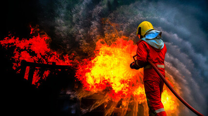 Firefighters, Firemen spraying high pressure water or suitable extinguishing agents to fire.fire...