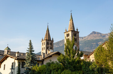 Fototapeta na wymiar the two towers of the Santa Maria Assunta Cathedral in Aosta city, Aosta Valley, Italy