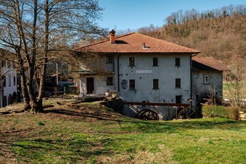Old farmhouse with watermill in Lombardy, north Italy