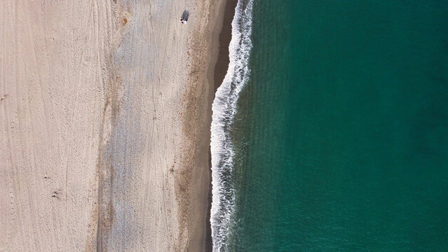 sean and sand on the beach from sky