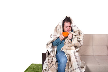 Funny fat man is sitting on the couch. Colds and ill health.