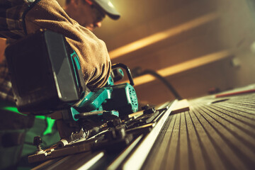 Table Saw Rail in Use by Construction Woodwork Worker