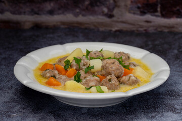 Seasoned soup with meatballs with vegetables. Turkish name; sulu kofte, eksili kofte, terbiyeli kofte)