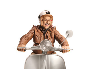 Cheerful mature man riding a silver scooter and smiling