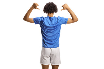 Rear view shot of an african american football player pointing at his back