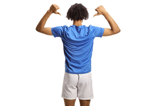 Rear view shot of an african american football player pointing at his back - Powered by Adobe