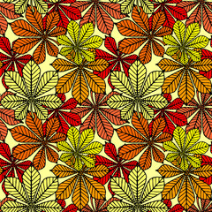 bright autumn seamless pattern of chestnut yellow and red leaves on a yellow background, texture, design