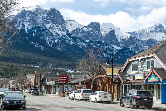 Canmore, Alberta, Canada, March 24, 2021: Downtown Canmore with Rocky Mountains in the background.