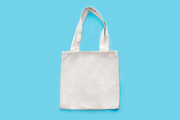 White cotton, canvas, tote, mesh bag on pastel blue background. Zero waste, no plastic, eco...