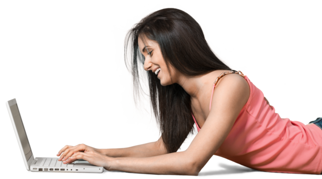 Young woman lying down in front of a laptop