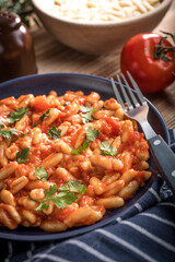 Cavatelli pasta with fresh tomato sauce.