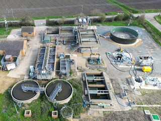 Aerial view of a newly extended sewage treatment works showing the stage collection ponds together...