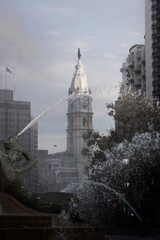 City hall behind fountains