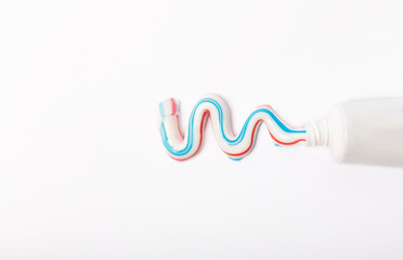  Tube of toothpaste isolated on white background. Close-up. Prevention of dental plaque and caries. Fresh breath. Dentistry concept. Oral care.