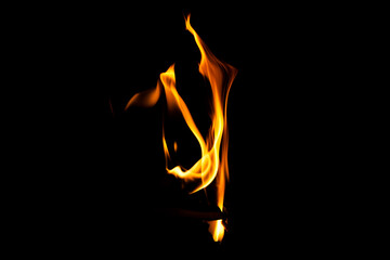 Fire flame texture. Burning material backdrop. Burn effect pattern. Blaze and torch wallpaper. Heat and haze backdrop.