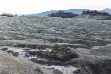 landscape in the mountains with mud volcano
