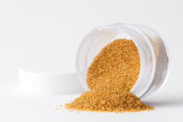 Edible Shimmer Powder Spilled from a Jar