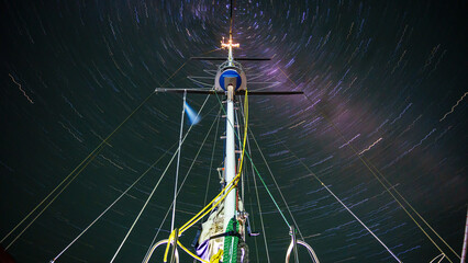 Sailboat mast in the night sky