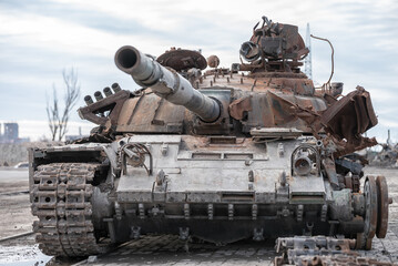 damaged military tank on a city street in Ukraine