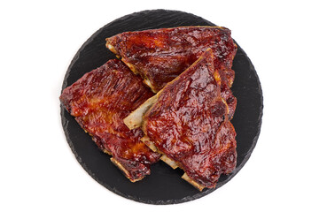 Roasted Pork Ribs with herbs, isolated on a white background. Close-up.