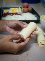 Obraz na płótnie Canvas person kneading dough