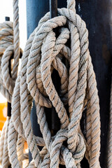 Closeup boat ropes. Braided rope heap.
