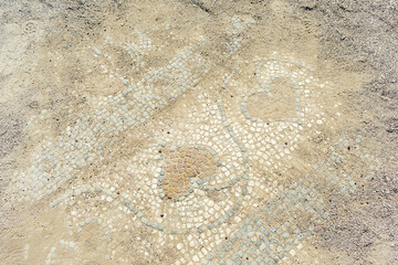 Mosaic on the floor in the ancient city of Perge. Ruins of the city of Perge in Turkey.