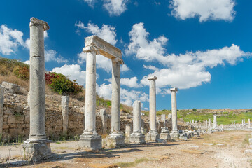 Fototapeta premium Street with columns in the ancient city of Perge. Ruins of the ancient city.