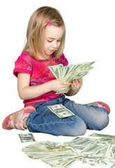 Cute little girl in pink dress with money isolated on white background