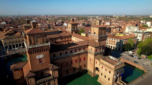 Ferrara - beautiful medieval town in Emilia Romagna, Italy. aerial drone video of castle Estense in historic center