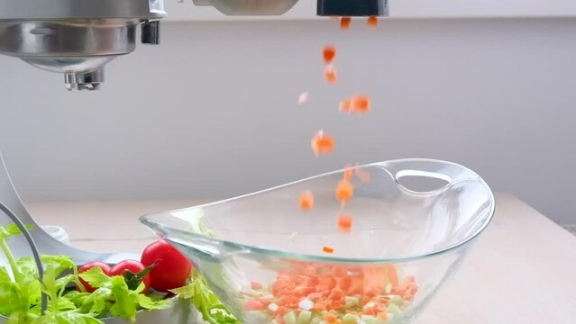 Chop and mix. Chopped carrot in the food processor and olive oil Cutting Carrot. High quality FullHD footage